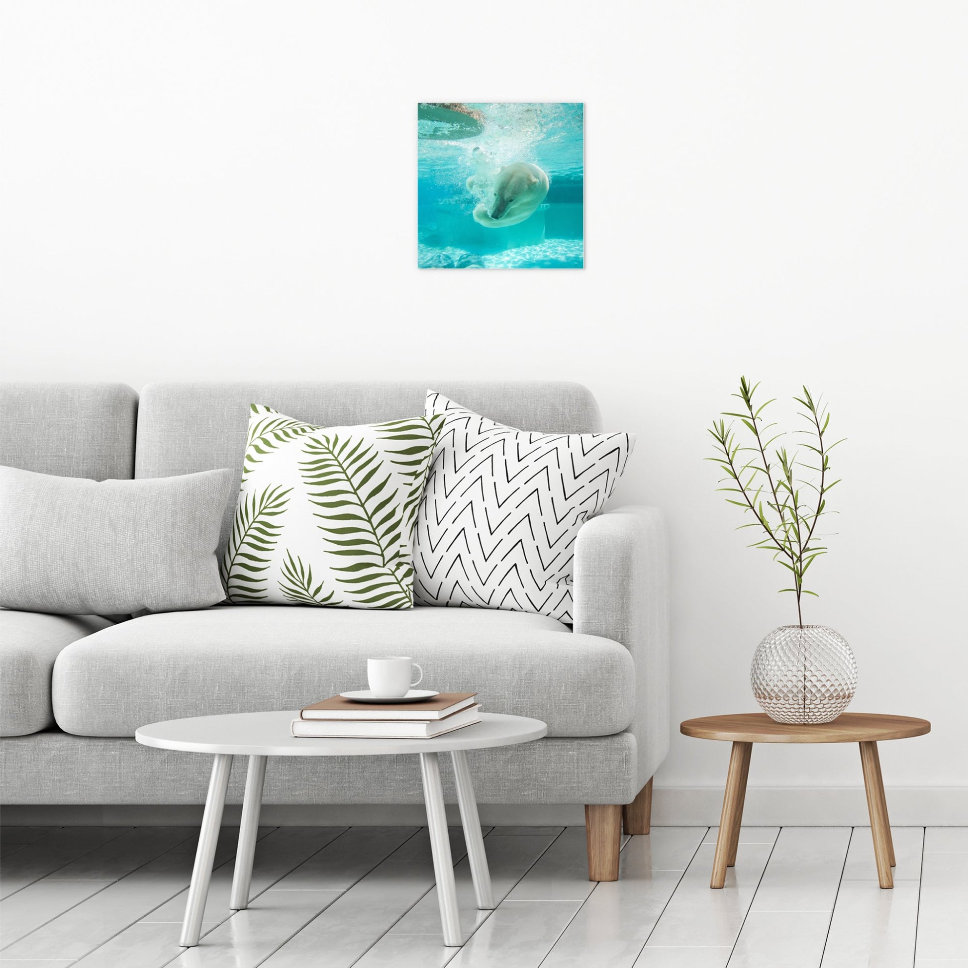 A contemporary modern room view showing a medium size metal art poster display plate with printed design of a Polar Bear Under Water