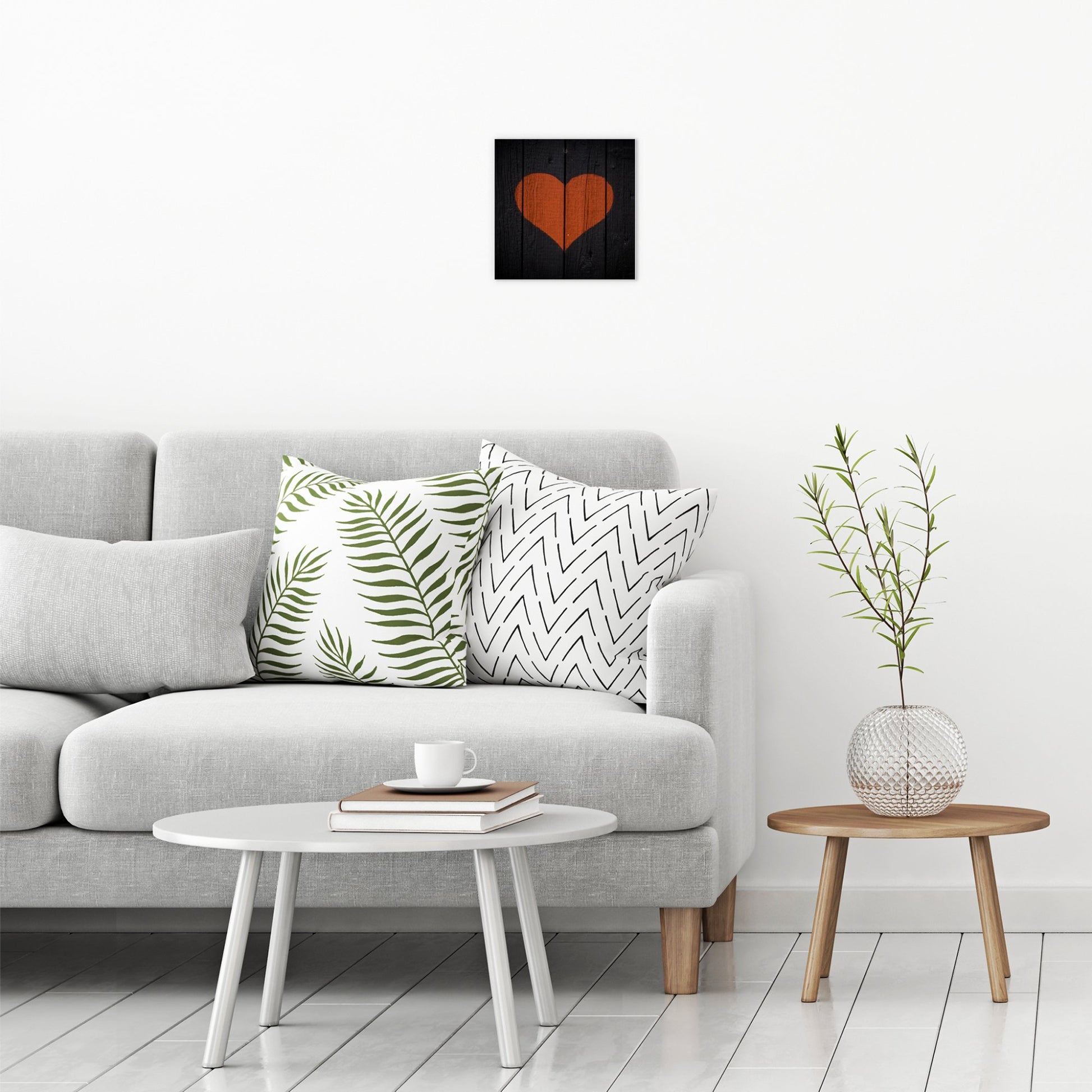A contemporary modern room view showing a small size metal art poster display plate with printed design of a Painted Wooden Heart