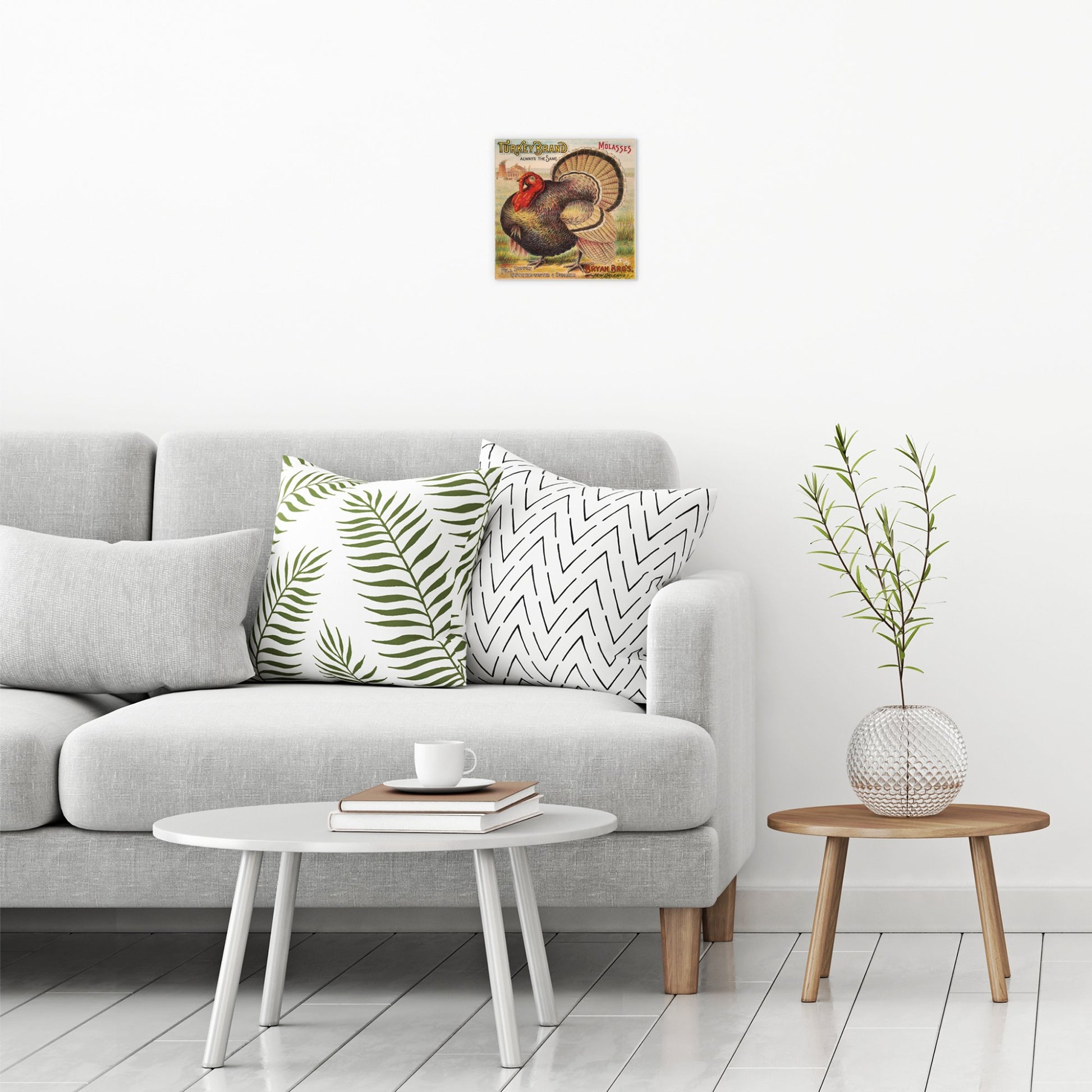 A contemporary modern room view showing a small size metal art poster display plate with printed design of a Turkey Brand Molasses Vintage Poster