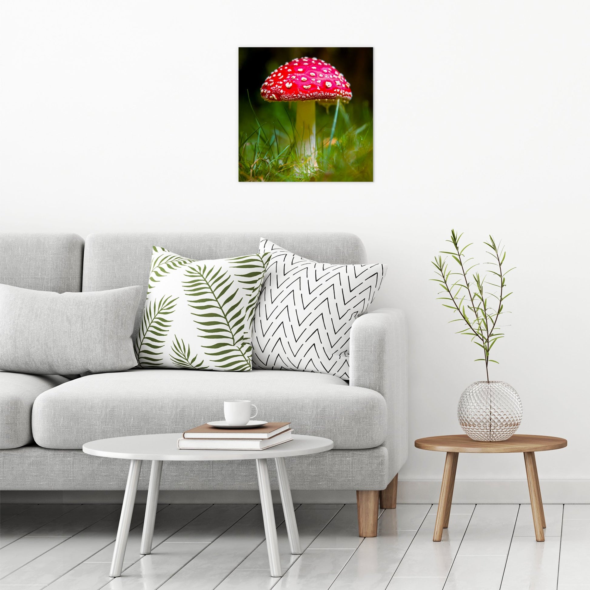 A contemporary modern room view showing a large size metal art poster display plate with printed design of a Fly Agaric (Amanita muscaria) Fungi