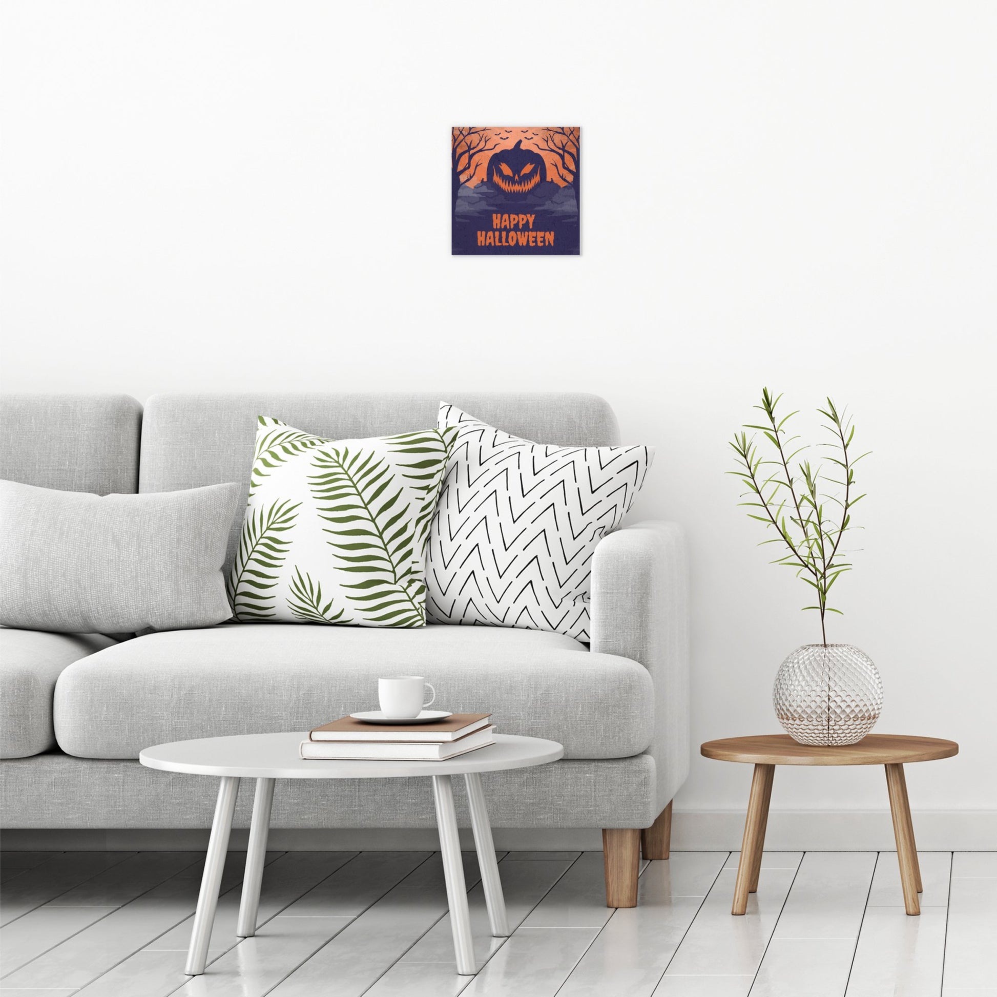 A contemporary modern room view showing a small size metal art poster display plate with printed design of a Happy Halloween Scary Pumpkin