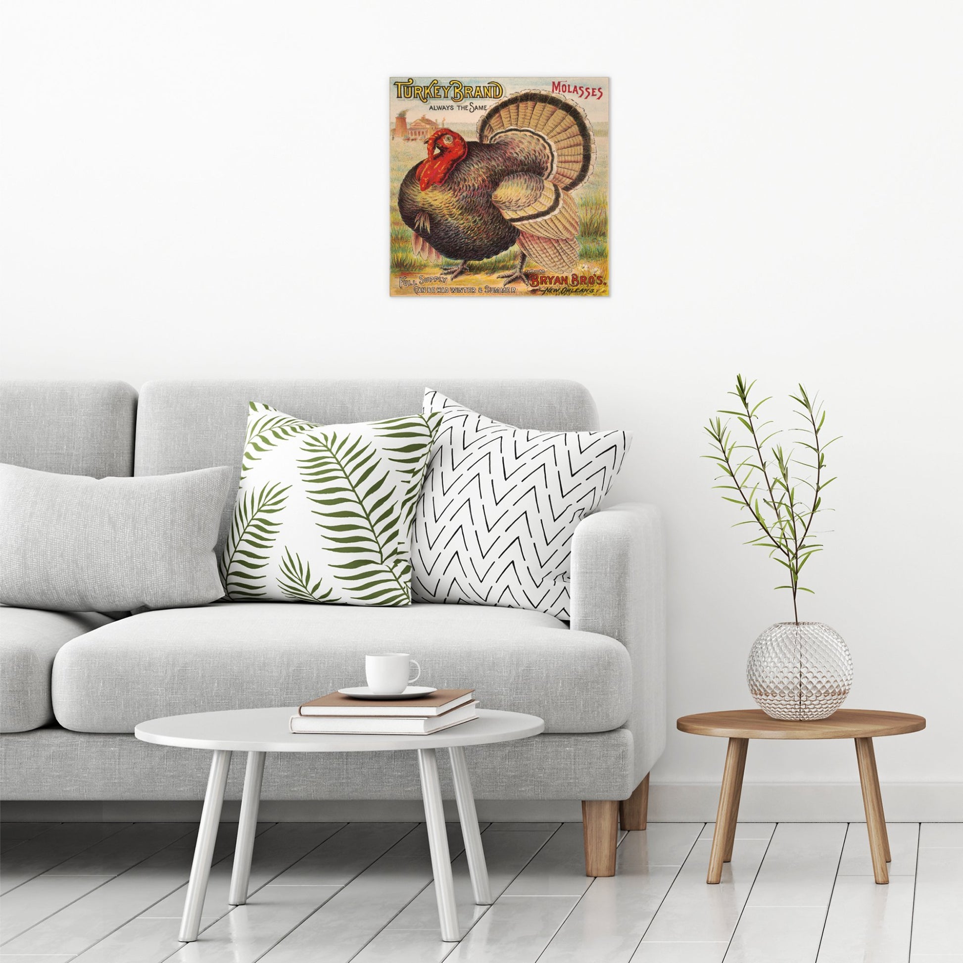 A contemporary modern room view showing a large size metal art poster display plate with printed design of a Turkey Brand Molasses Vintage Poster