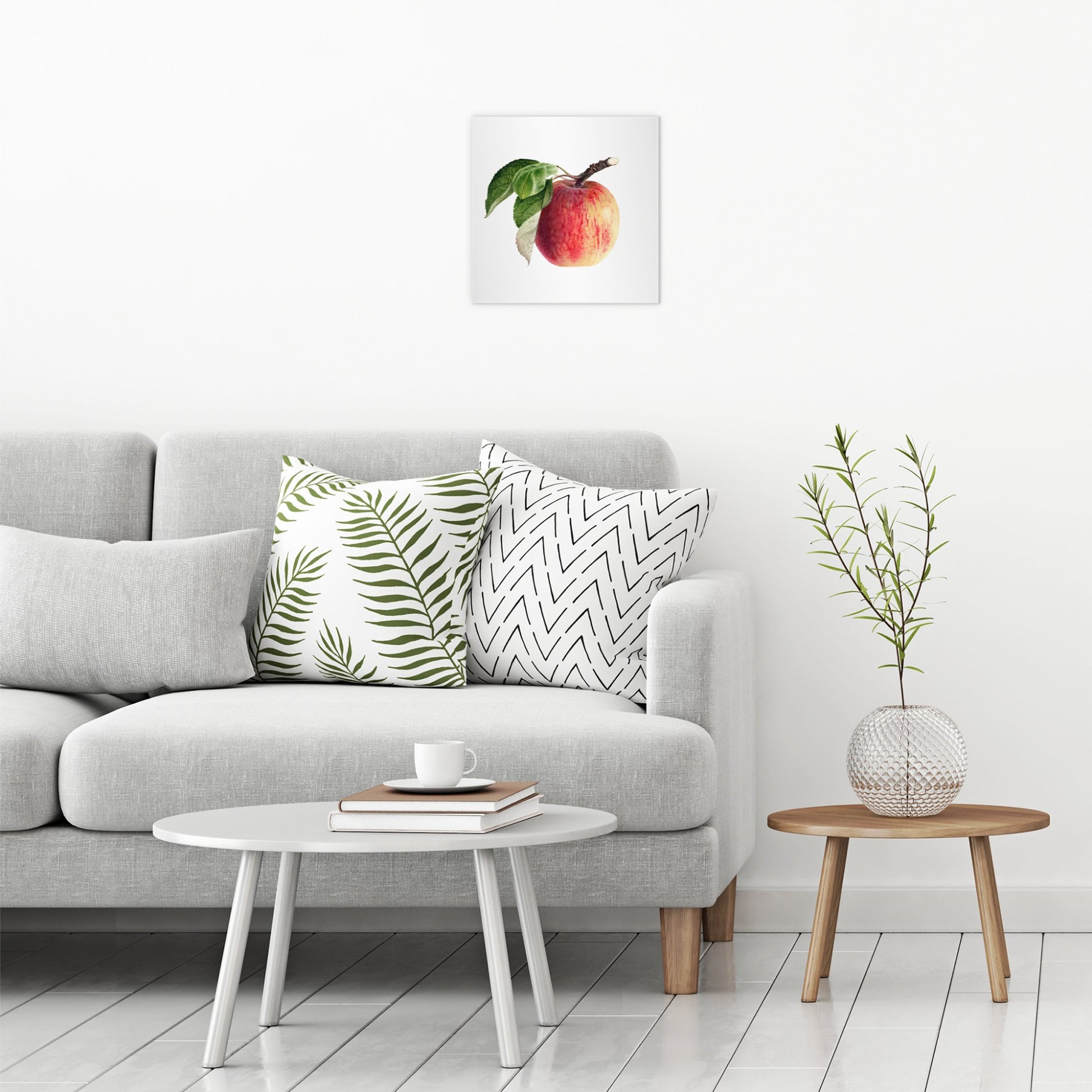 A contemporary modern room view showing a medium size metal art poster display plate with printed design of a Vintage Apple Illustration