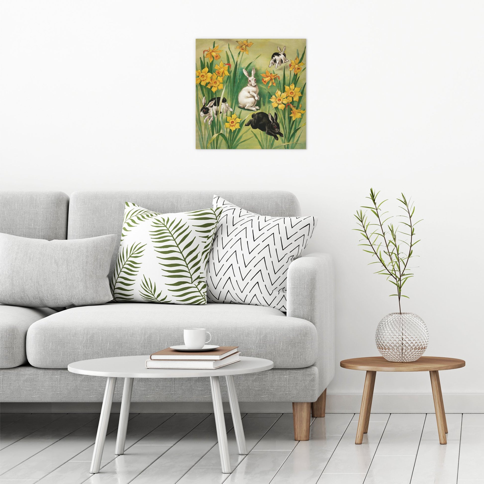 A contemporary modern room view showing a large size metal art poster display plate with printed design of a Bunnies and Daffodils Vintage Illustration