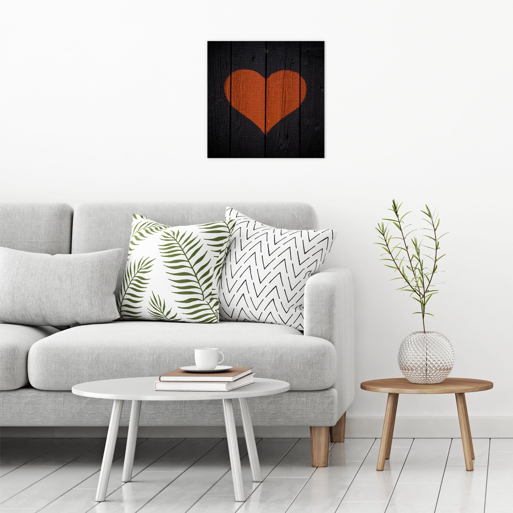 A contemporary modern room view showing a large size metal art poster display plate with printed design of a Painted Wooden Heart