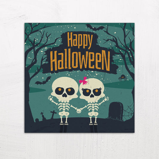 A large size metal art poster display plate with printed design of a Happy Halloween Cute Skeletons