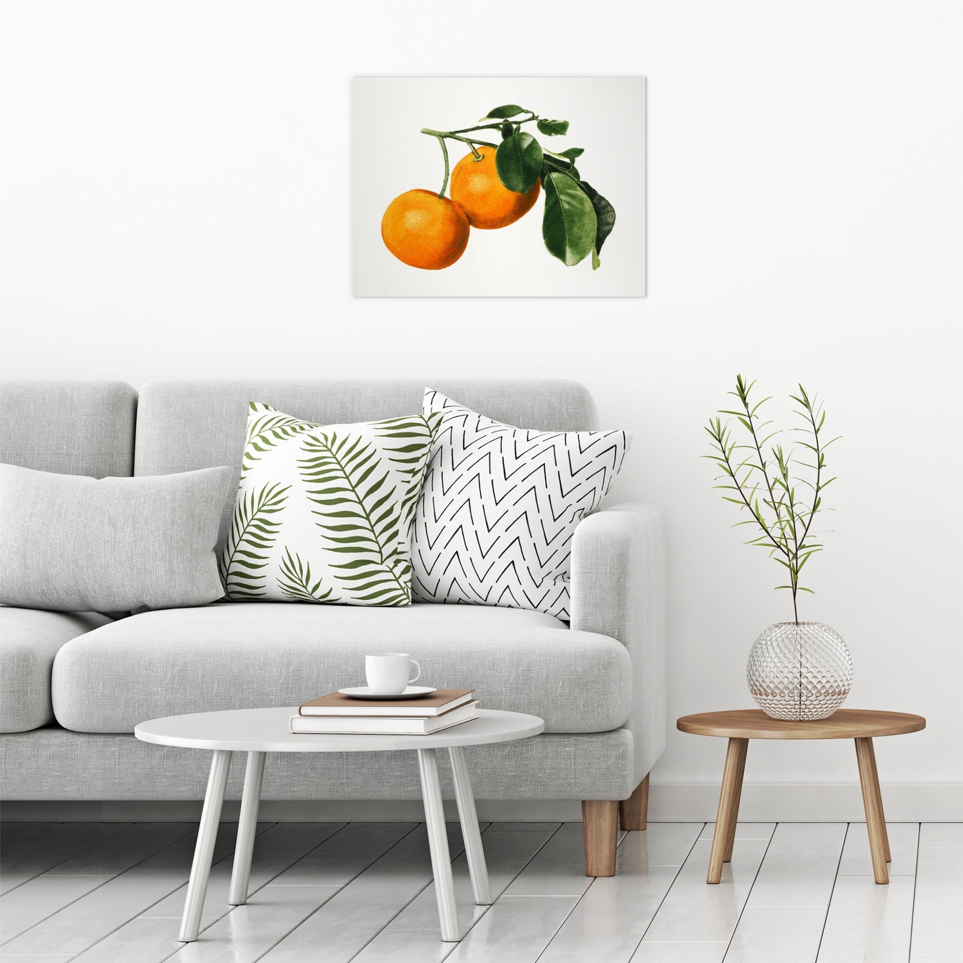 A contemporary modern room view showing a large size metal art poster display plate with printed design of a Vintage Watercolour Illustration of Oranges
