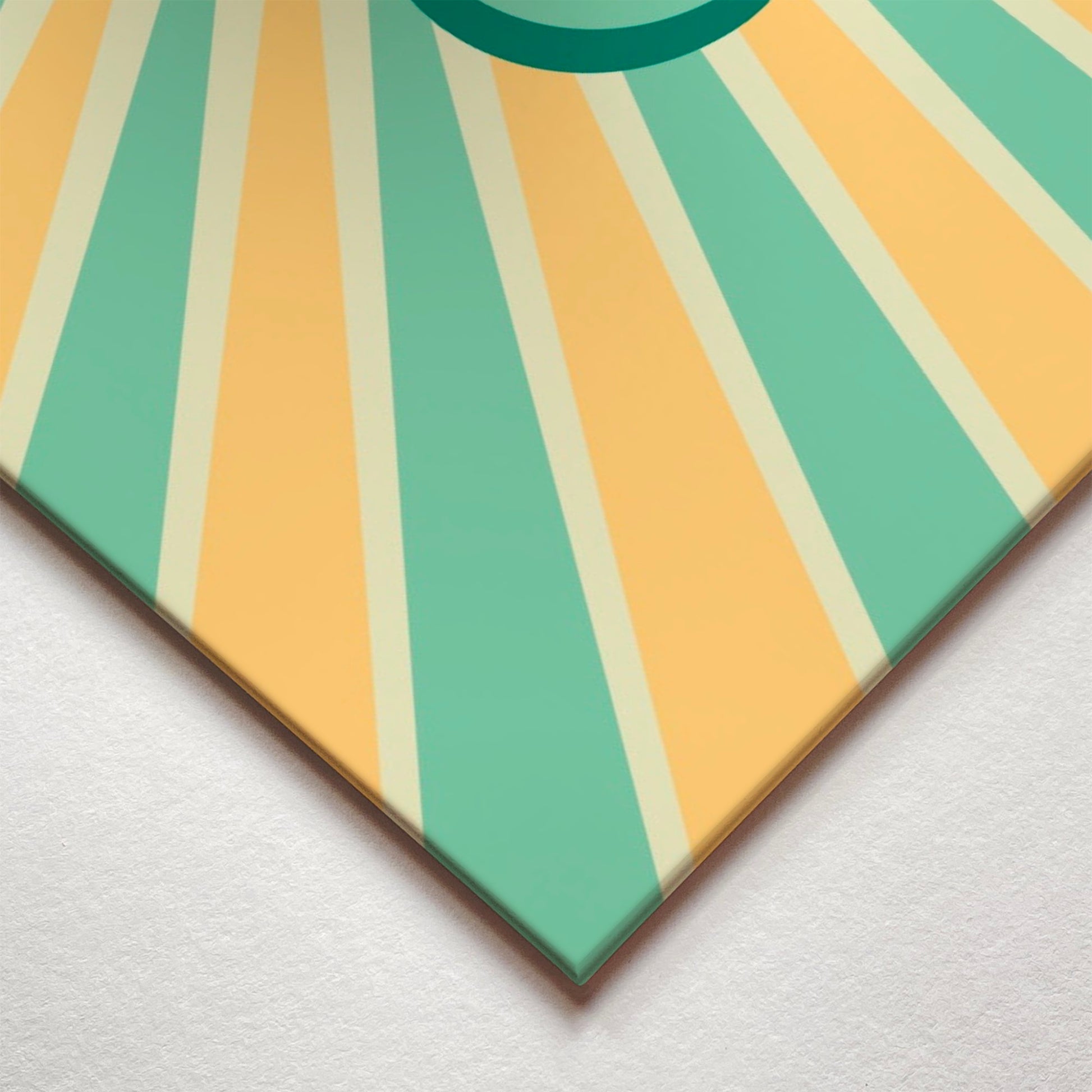 A closeup corner detail view of a metal art poster display plate with printed design of a Hello Sunshine Quote