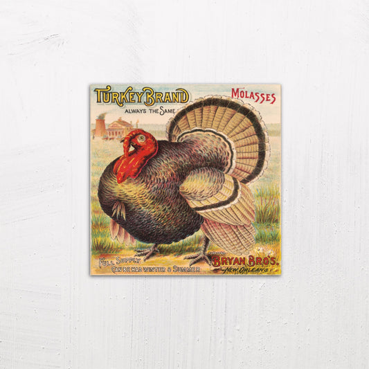 A medium size metal art poster display plate with printed design of a Turkey Brand Molasses Vintage Poster