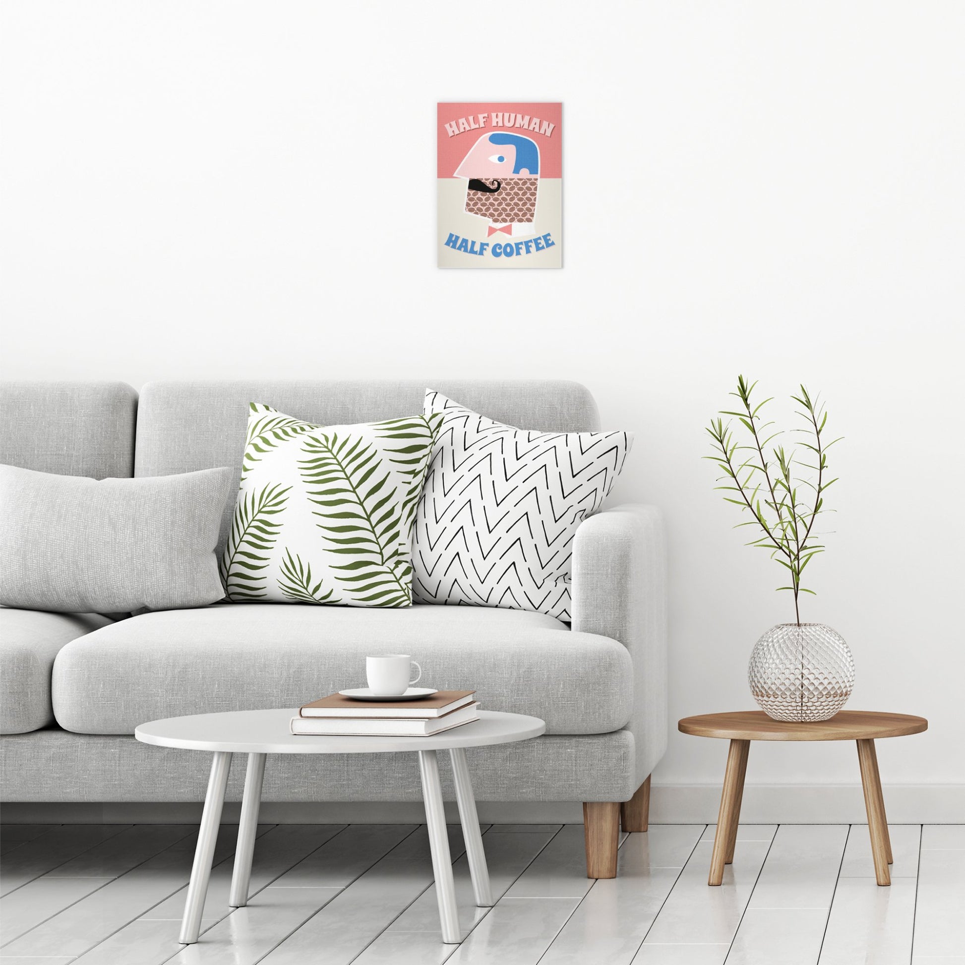 A contemporary modern room view showing a small size metal art poster display plate with printed design of a Half Human Half Coffee' Fun Retro Quote