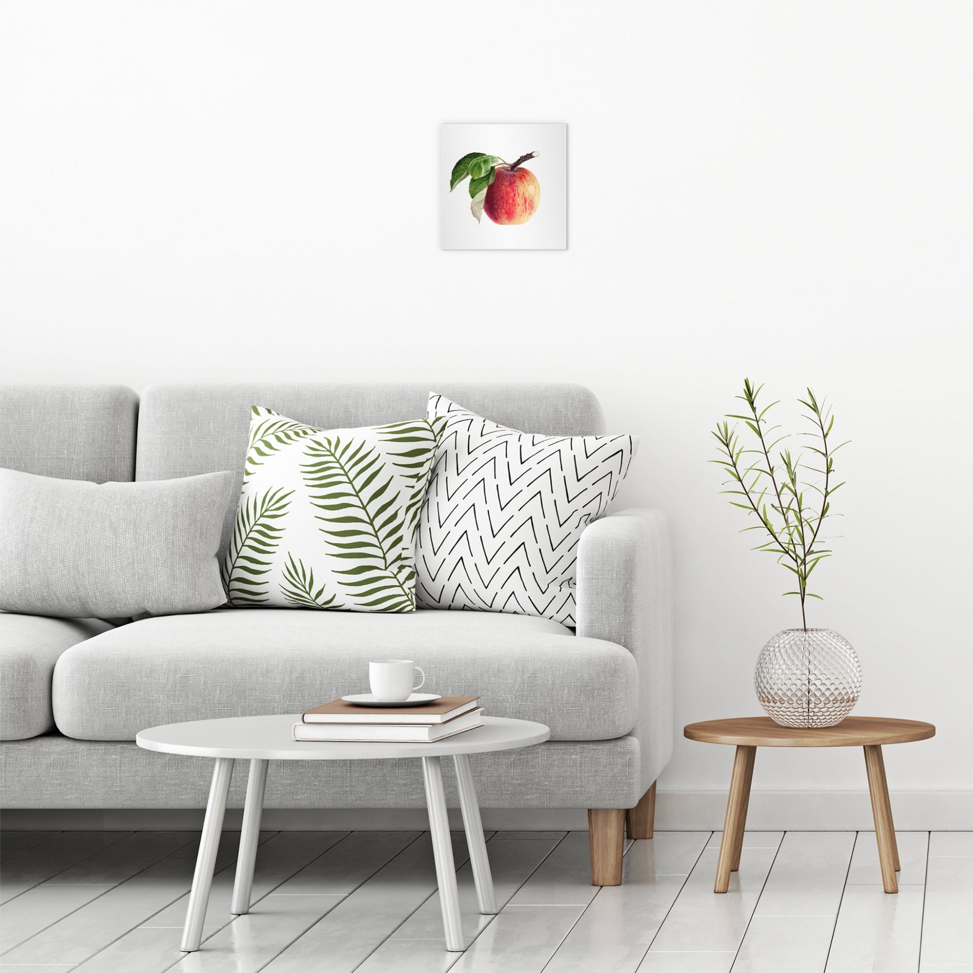 A contemporary modern room view showing a small size metal art poster display plate with printed design of a Vintage Apple Illustration