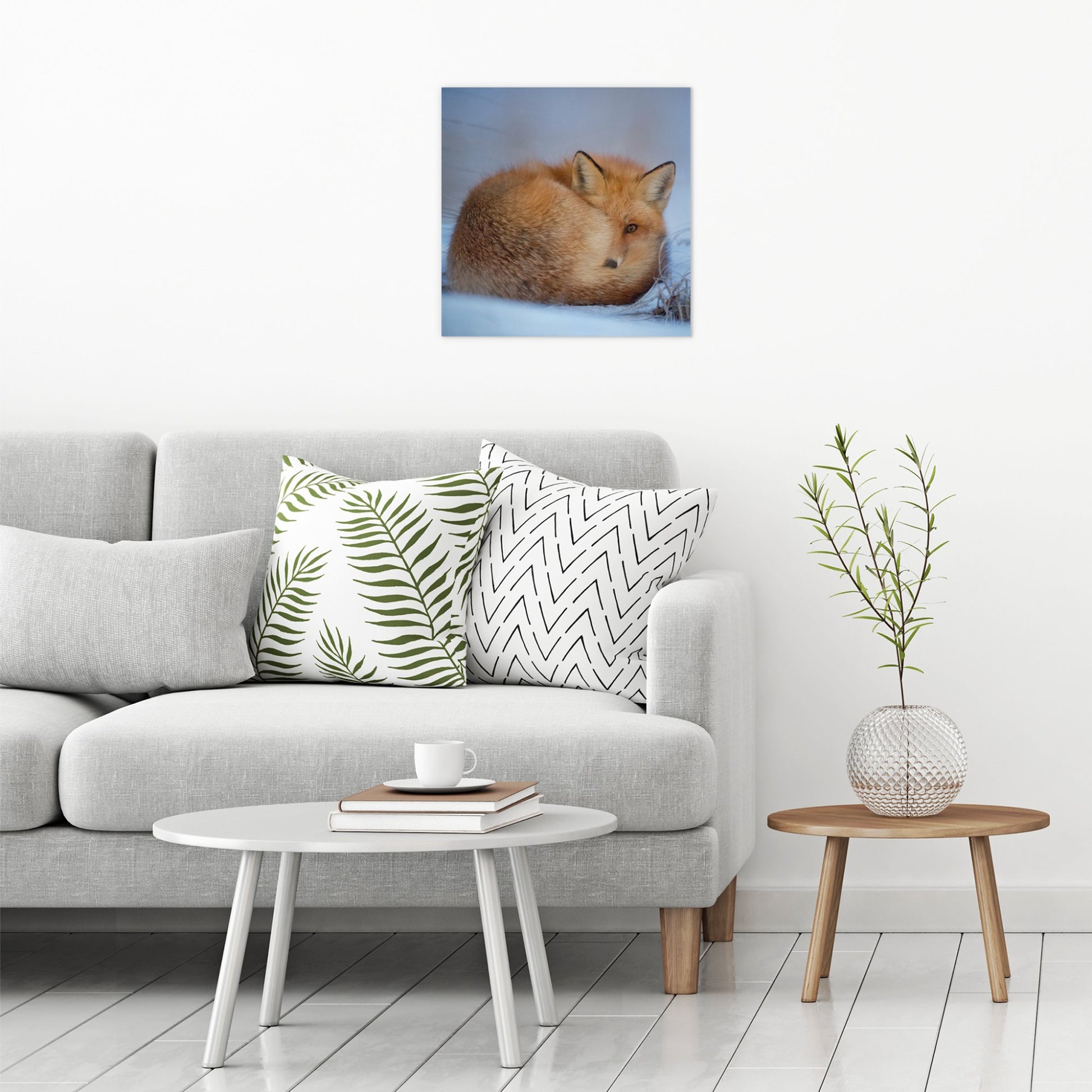 A contemporary modern room view showing a large size metal art poster display plate with printed design of a A Cute Fox in the Snow