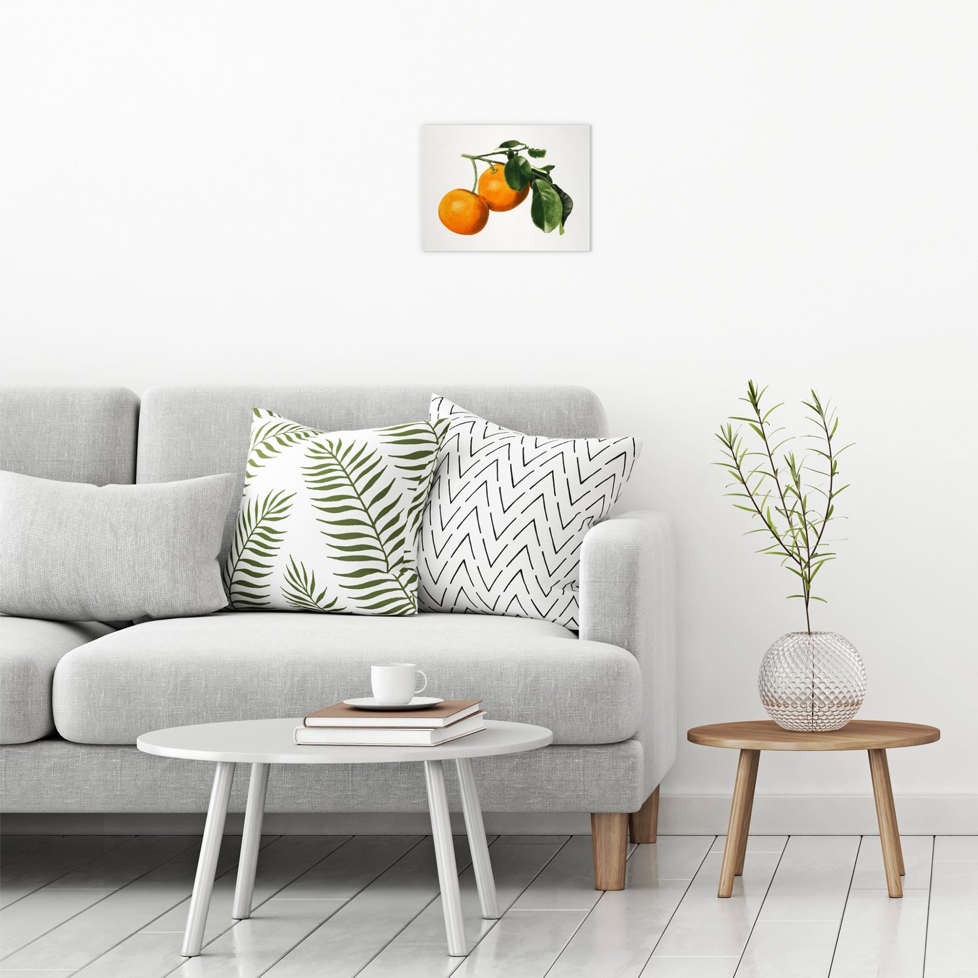 A contemporary modern room view showing a small size metal art poster display plate with printed design of a Vintage Watercolour Illustration of Oranges