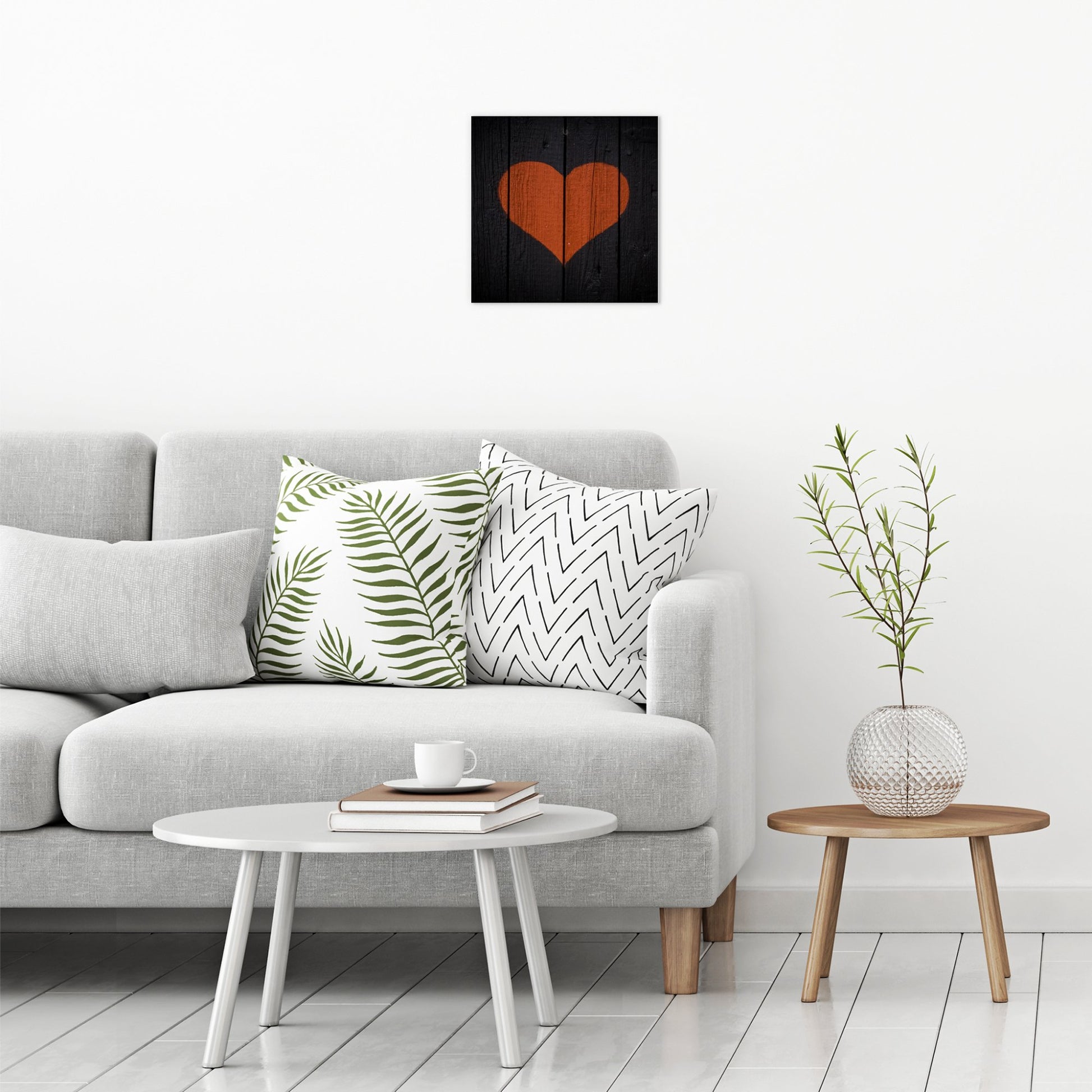 A contemporary modern room view showing a medium size metal art poster display plate with printed design of a Painted Wooden Heart