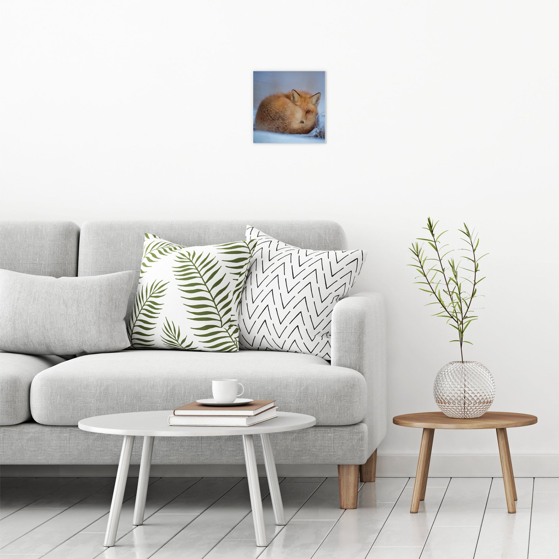A contemporary modern room view showing a small size metal art poster display plate with printed design of a A Cute Fox in the Snow