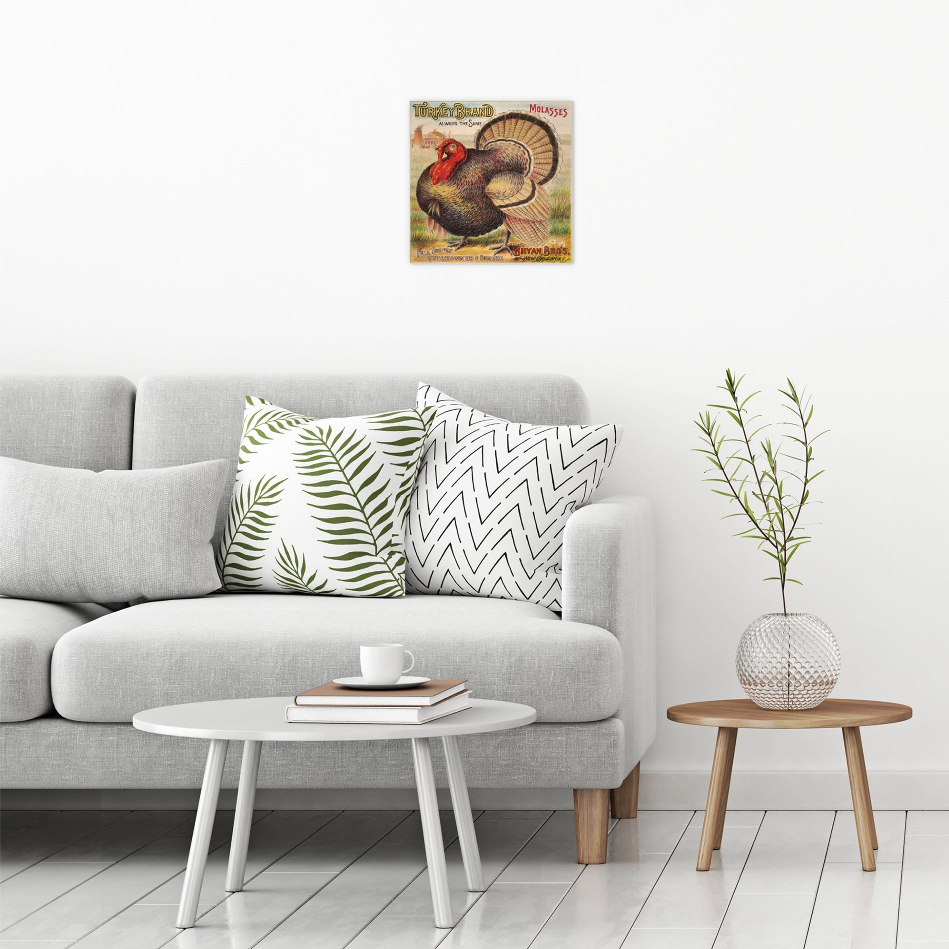 A contemporary modern room view showing a medium size metal art poster display plate with printed design of a Turkey Brand Molasses Vintage Poster