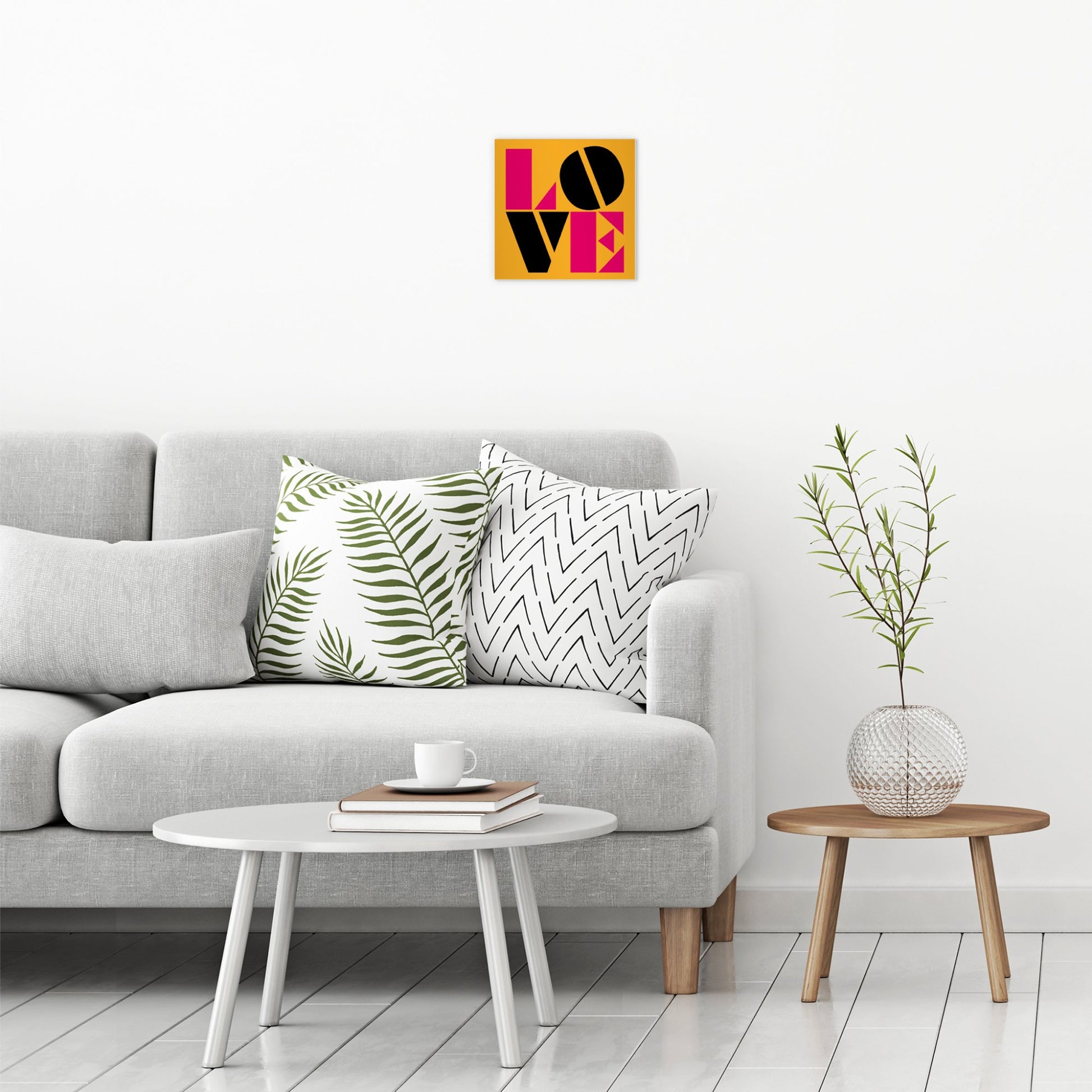 A contemporary modern room view showing a small size metal art poster display plate with printed design of a Typographic Love Design
