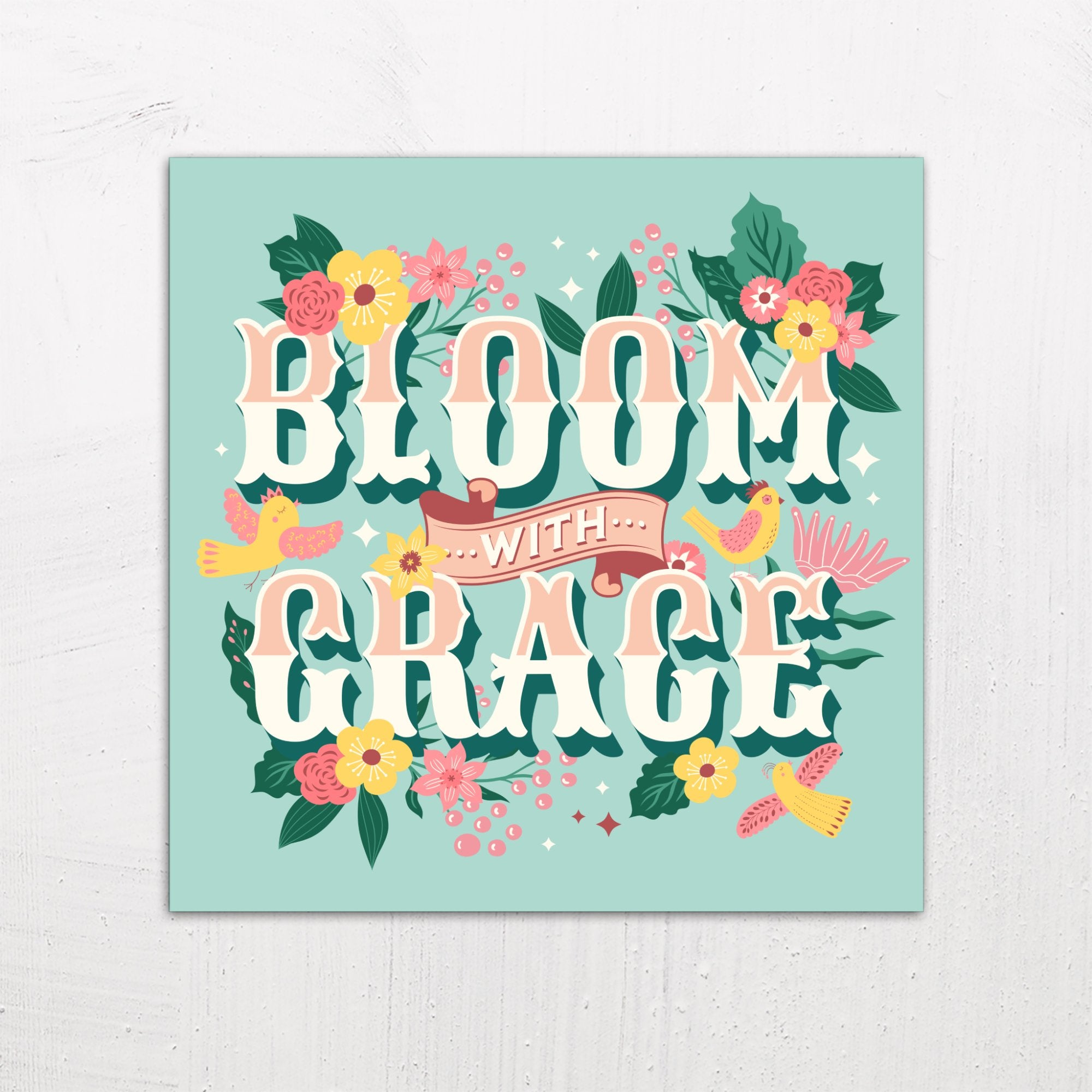 A large size metal art poster display plate with printed design of a Bloom with Grace Inspirational Quote
