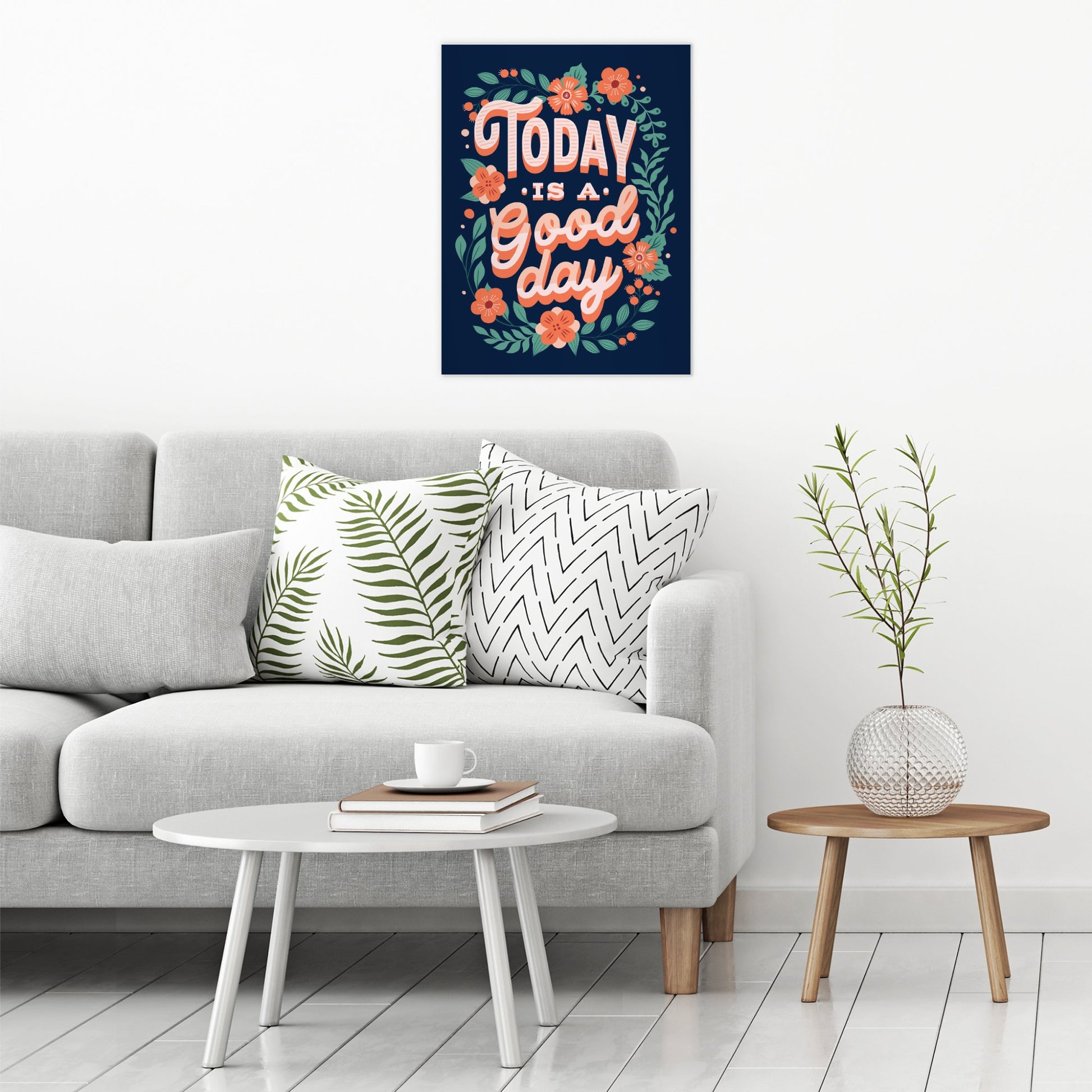 A contemporary modern room view showing a large size metal art poster display plate with printed design of a Today is a Good Day Inspirational Quote