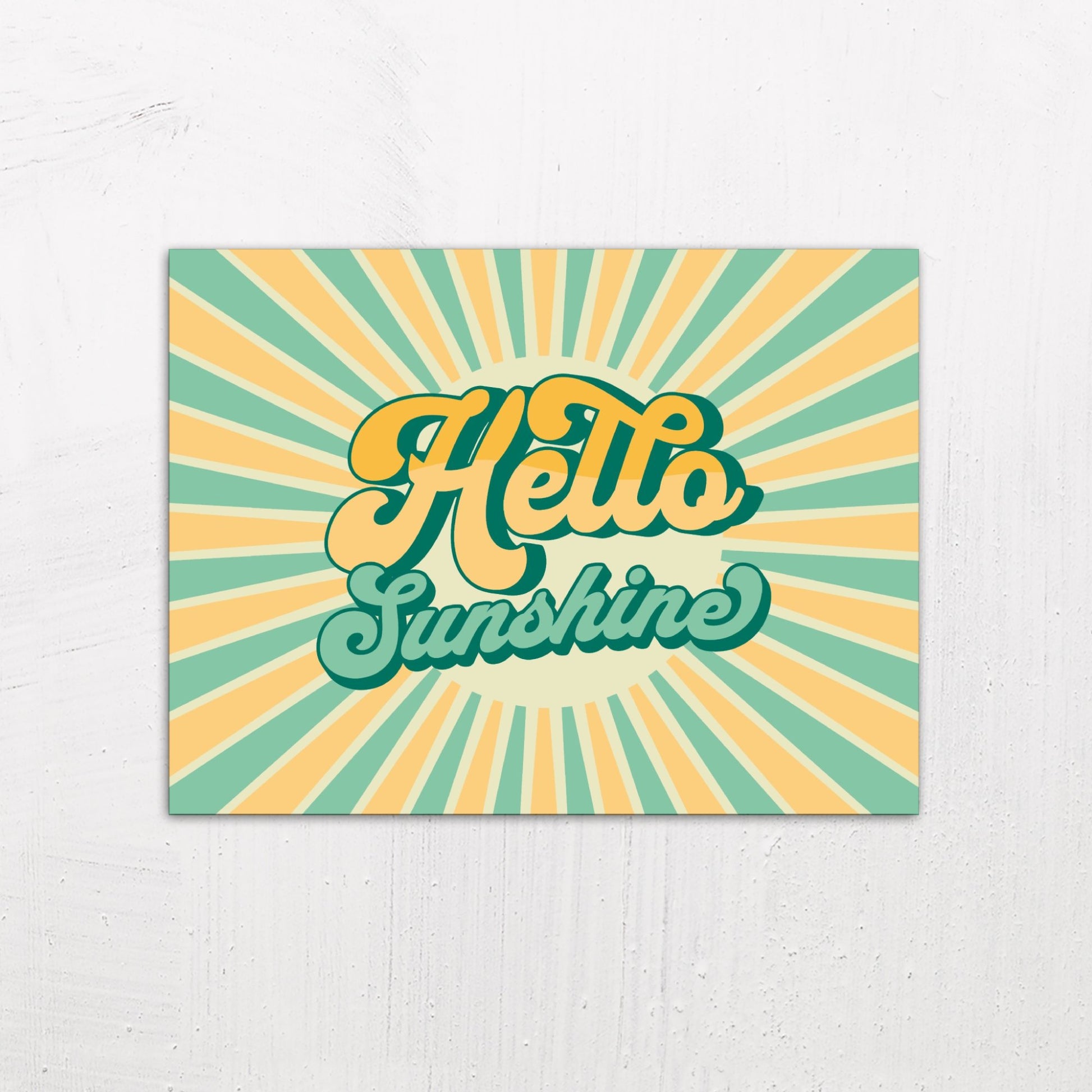A medium size metal art poster display plate with printed design of a Hello Sunshine Quote