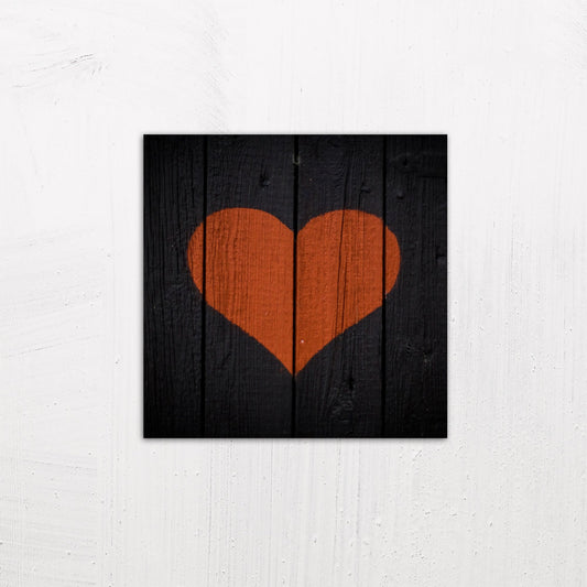 A medium size metal art poster display plate with printed design of a Painted Wooden Heart