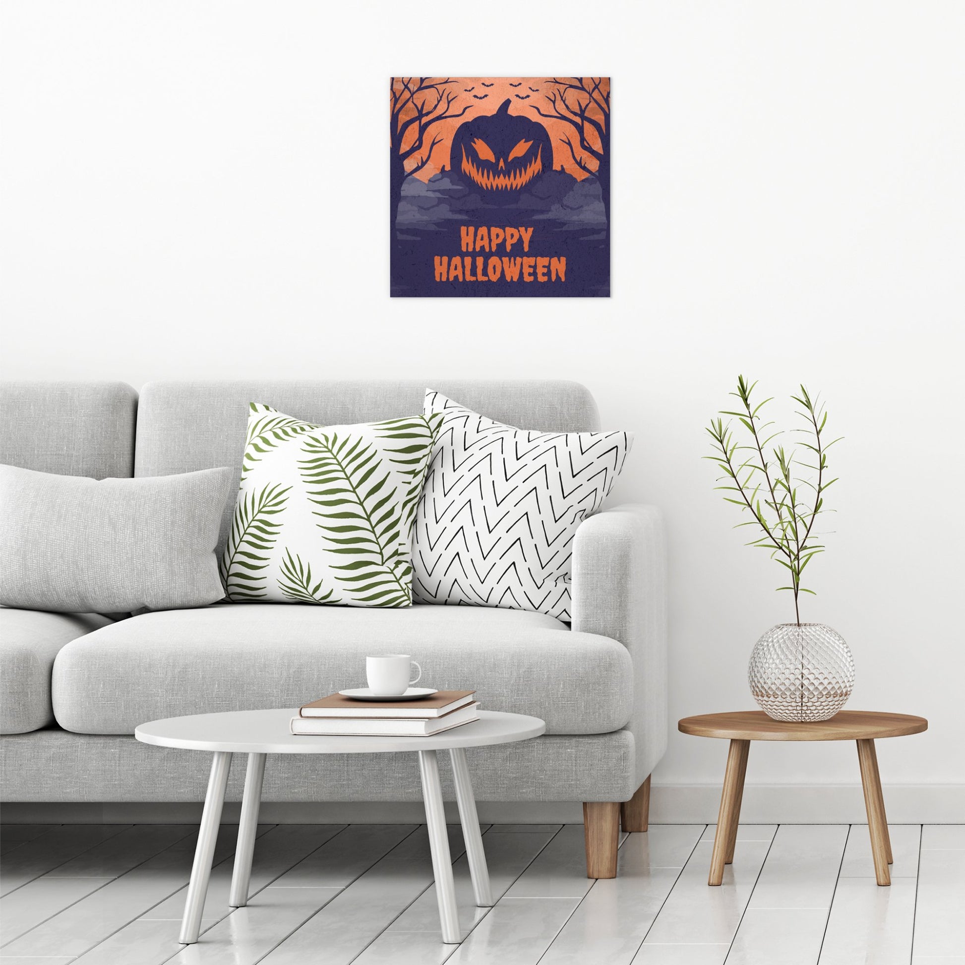 A contemporary modern room view showing a large size metal art poster display plate with printed design of a Happy Halloween Scary Pumpkin