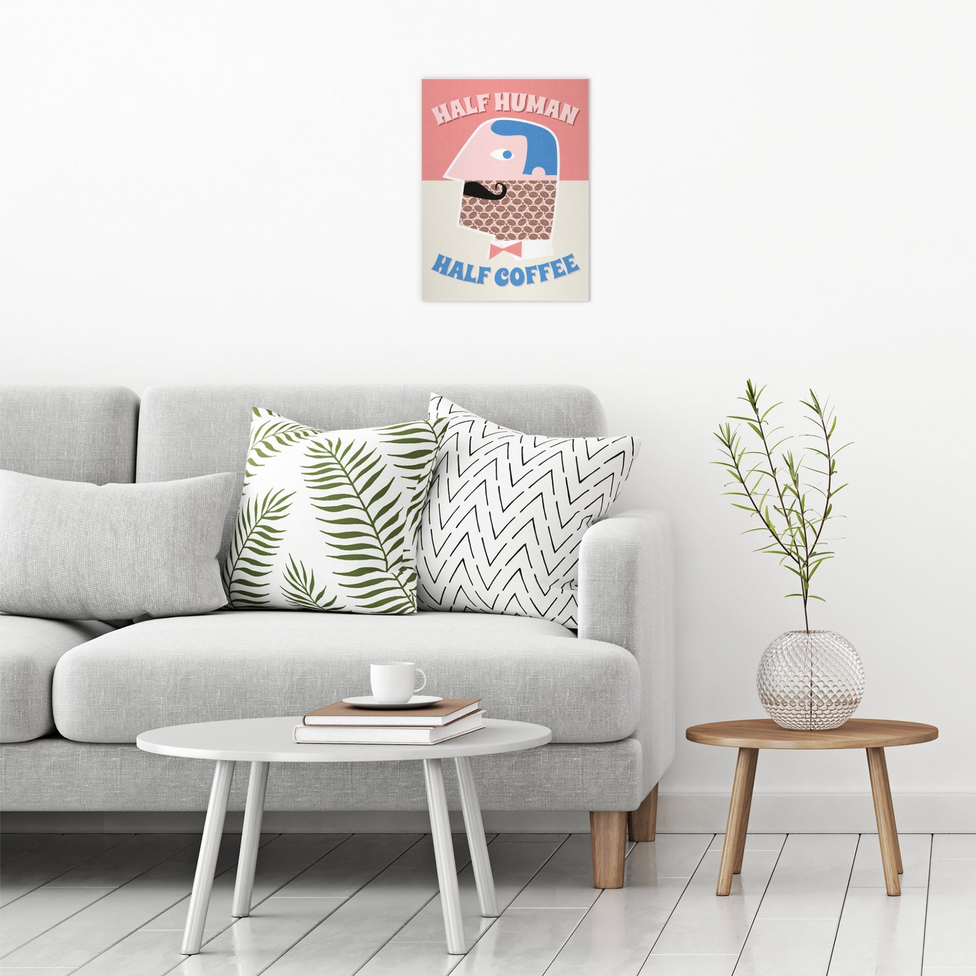 A contemporary modern room view showing a medium size metal art poster display plate with printed design of a Half Human Half Coffee' Fun Retro Quote