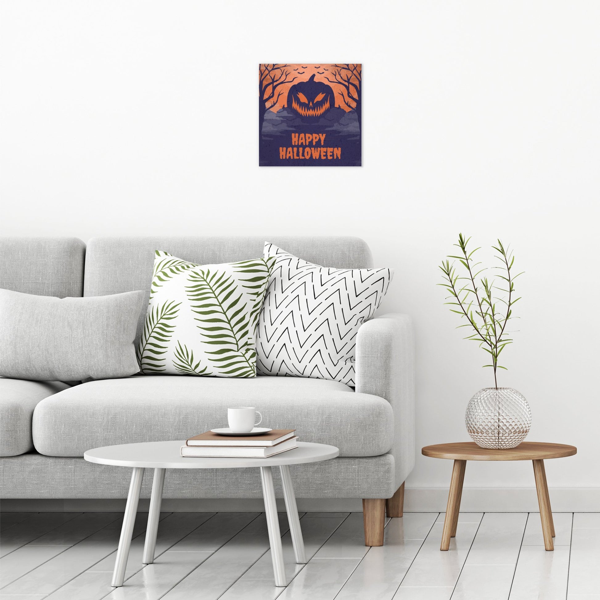 A contemporary modern room view showing a medium size metal art poster display plate with printed design of a Happy Halloween Scary Pumpkin