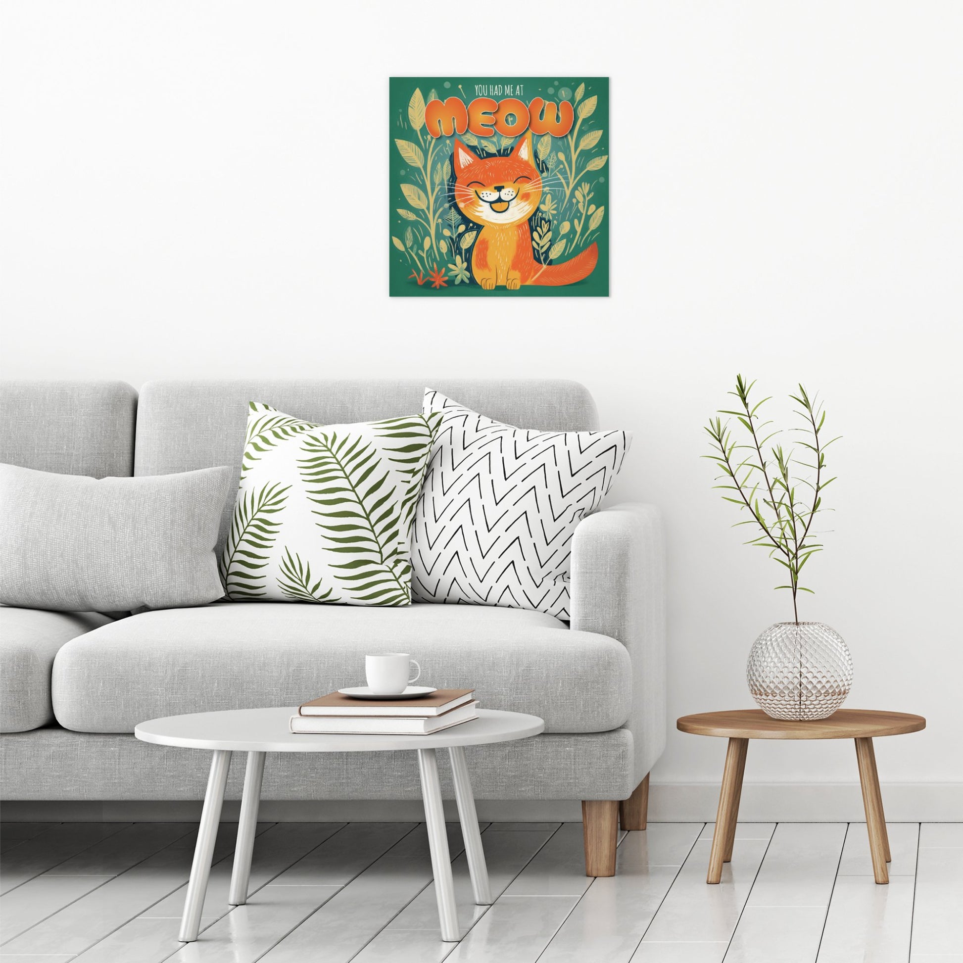A contemporary modern room view showing a large size metal art poster display plate with printed design of a You Had Me At Meow - Cute Cat Quote