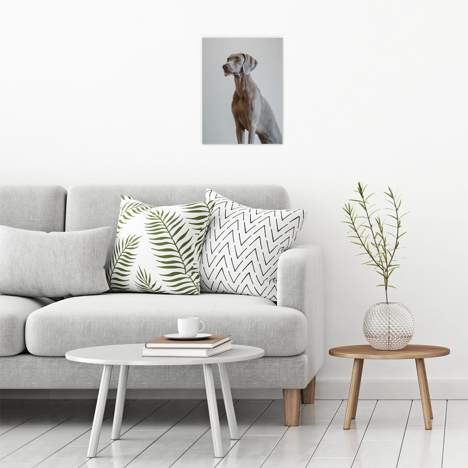 A contemporary modern room view showing a medium size metal art poster display plate with printed design of a Weimaraner