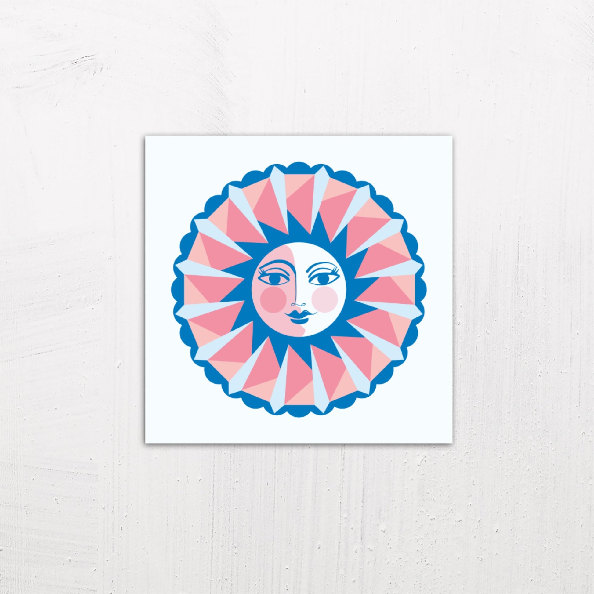 A medium size metal art poster display plate with printed design of a Sun Face Design