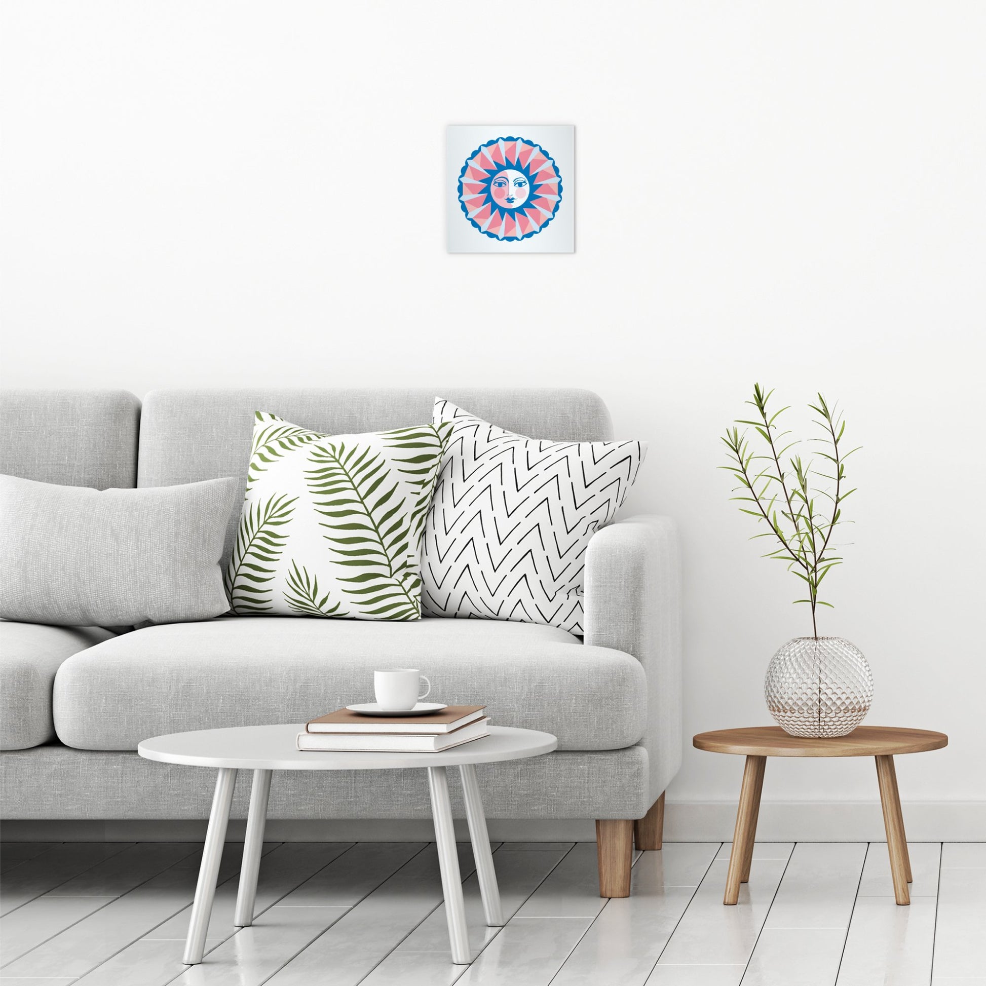 A contemporary modern room view showing a small size metal art poster display plate with printed design of a Sun Face Design